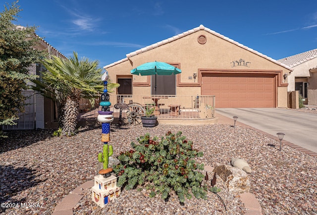 view of front of property with a garage