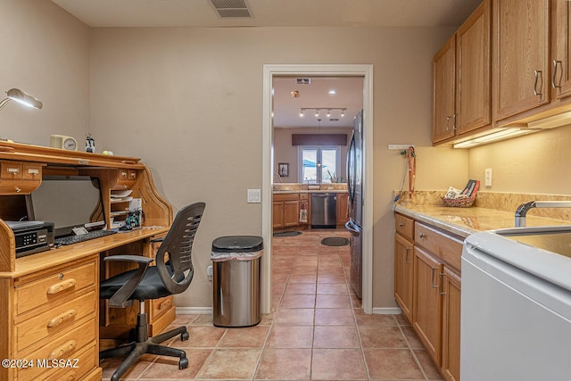 tiled home office with sink