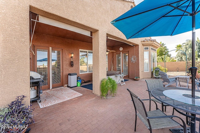 view of patio featuring a grill