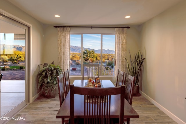 dining room featuring a mountain view