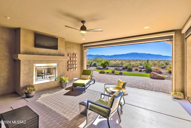 view of patio featuring ceiling fan