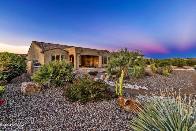 view of adobe home