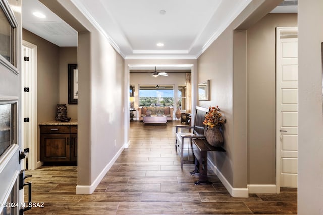 hallway featuring crown molding