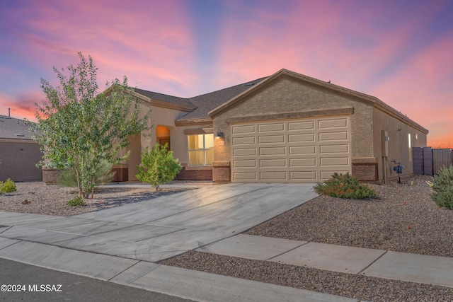 view of front of property featuring a garage