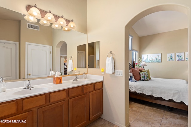 bathroom featuring vanity and tile patterned flooring