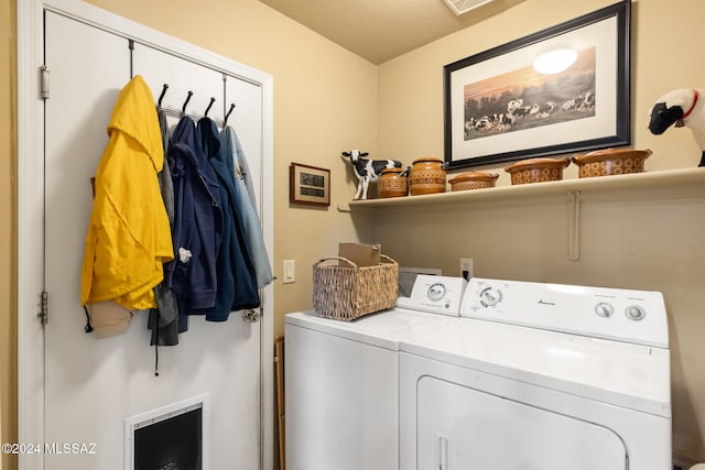 laundry room with washer and clothes dryer