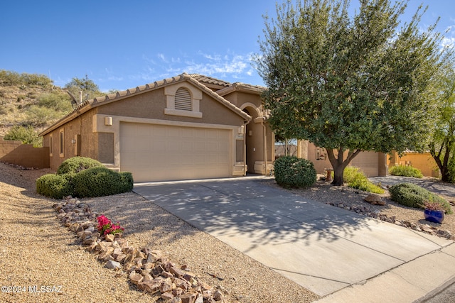 view of front of home with a garage