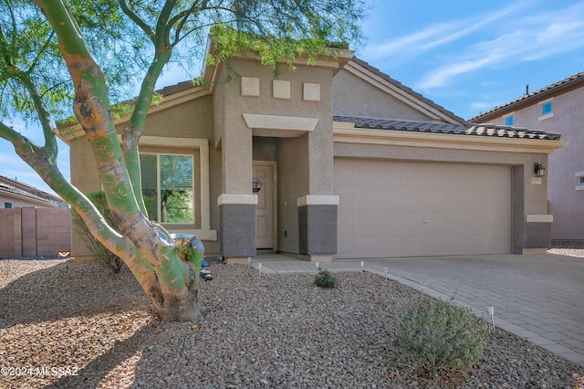 view of front of property featuring a garage