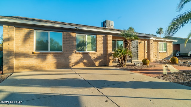 view of front of house featuring central AC unit