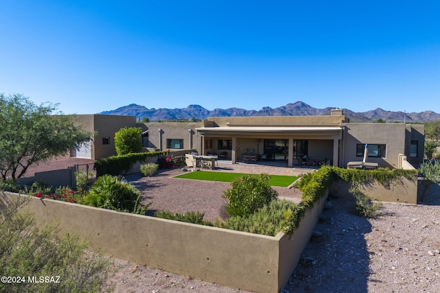 2321 Circulo De Anza, Tubac, AZ 85646 - rear view of property with stucco siding, a mountain view, a patio, and fence