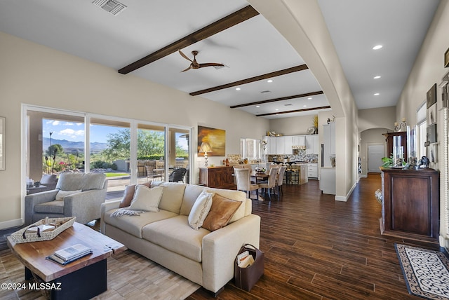 2321 Circulo De Anza, Tubac, AZ 85646 - living area featuring arched walkways, beamed ceiling, recessed lighting, dark wood-style floors, and ceiling fan