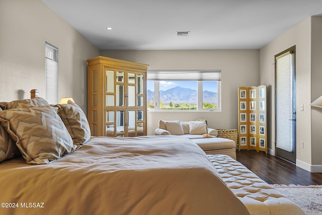 bedroom featuring dark wood-type flooring