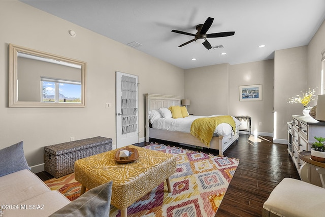 bedroom with dark wood-type flooring and ceiling fan