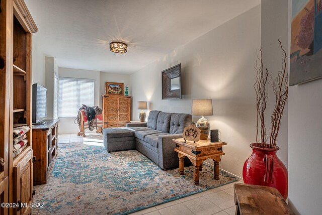 living room with light tile patterned floors