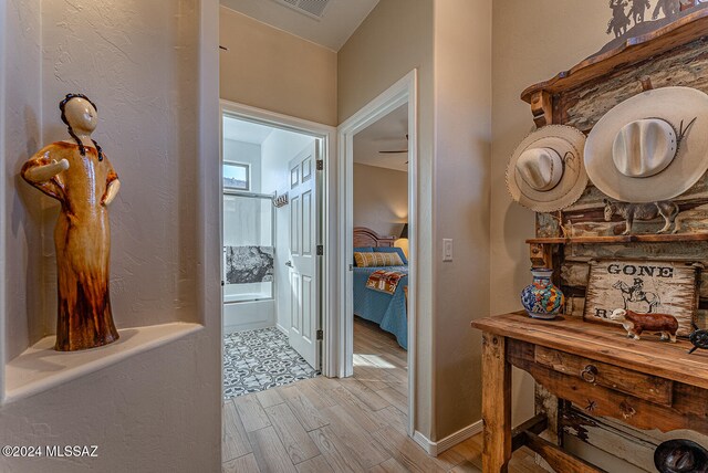 hallway featuring light wood-type flooring