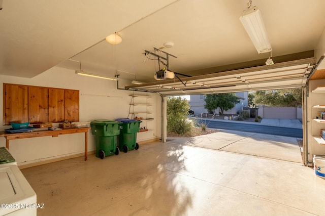 garage featuring a garage door opener