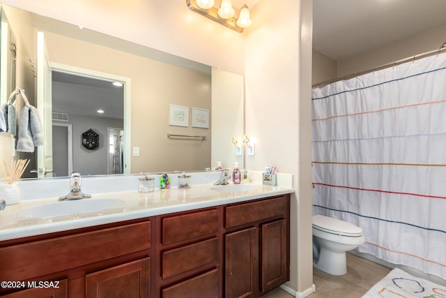 bathroom with walk in shower, vanity, toilet, and tile patterned flooring