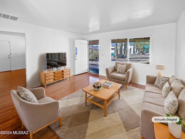 living room with light hardwood / wood-style floors