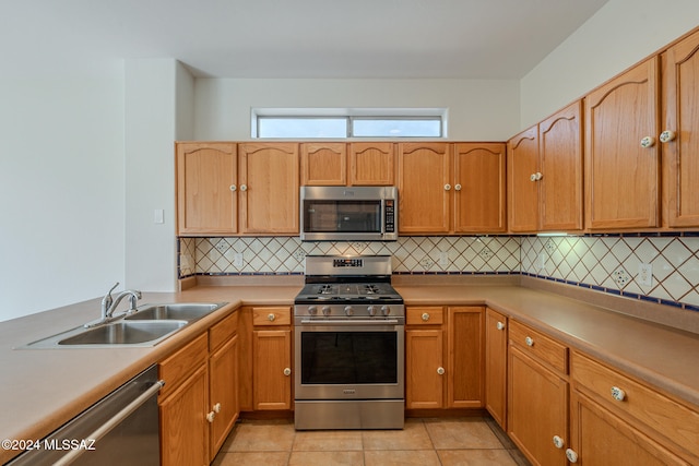 kitchen featuring decorative backsplash, stainless steel dishwasher, black fridge with ice dispenser, ceiling fan, and sink