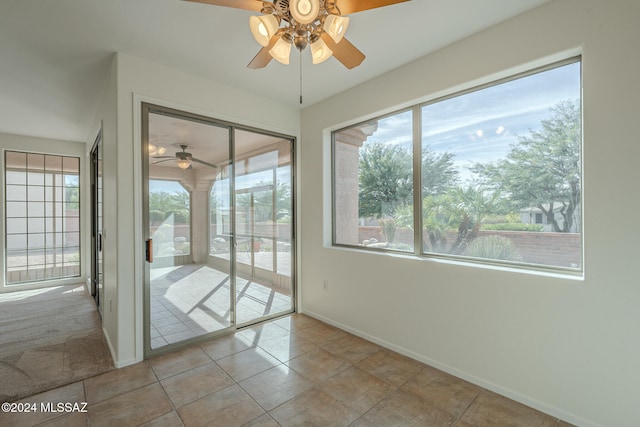 bedroom featuring ceiling fan and light colored carpet