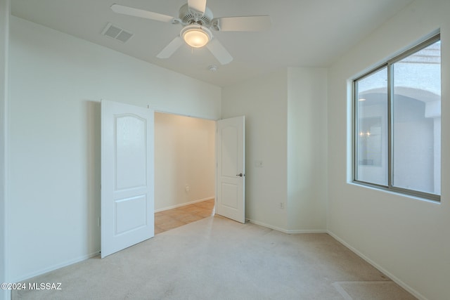 bathroom with toilet, an enclosed shower, and vanity