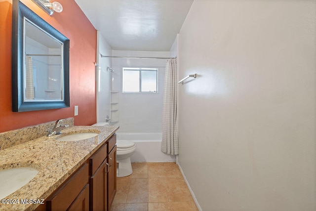 full bathroom featuring vanity, toilet, tile patterned floors, and shower / tub combo with curtain