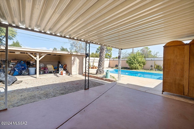 view of patio / terrace featuring a fenced in pool