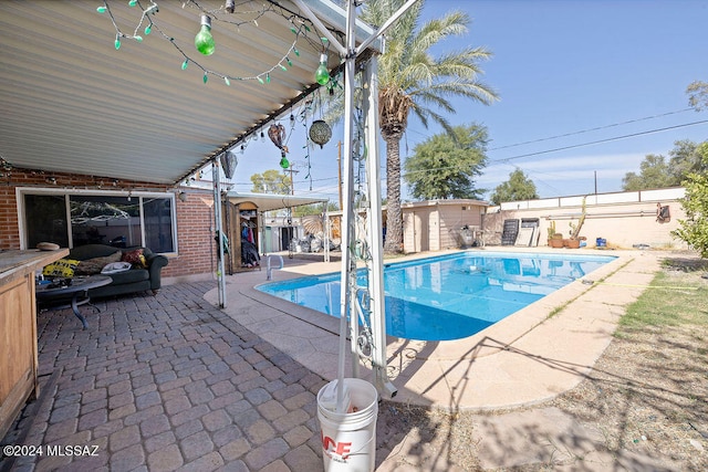 view of swimming pool featuring a patio