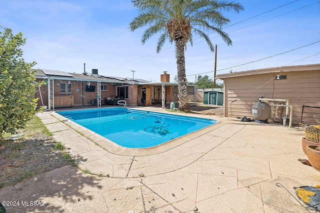 view of pool with a patio area