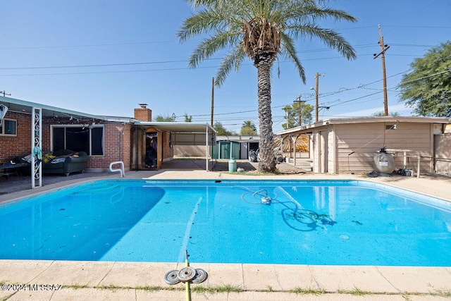 view of pool featuring a patio area