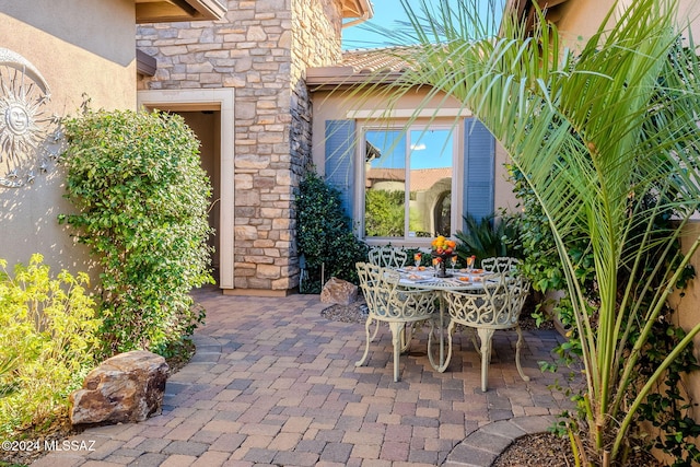 view of patio featuring outdoor dining space