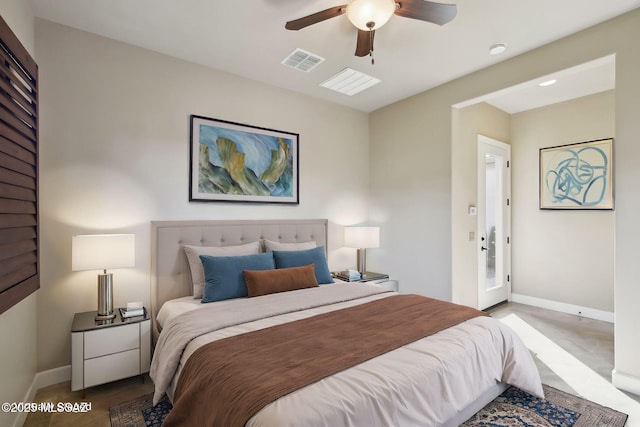 bedroom with ceiling fan, visible vents, and baseboards