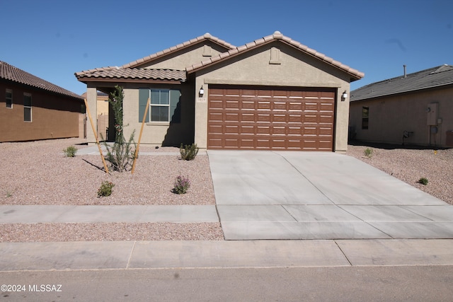 view of front of home with a garage