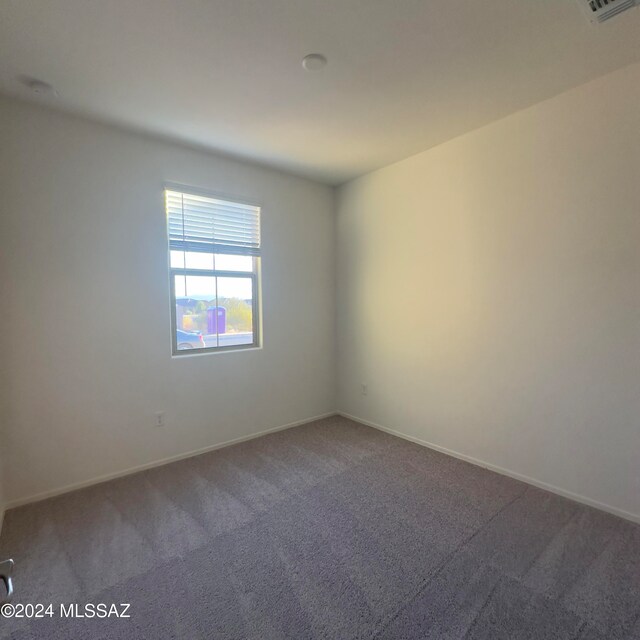 empty room with carpet floors