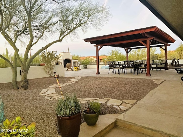 view of home's community featuring a gazebo and a patio area