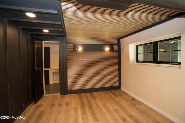 interior space featuring crown molding and light wood-type flooring