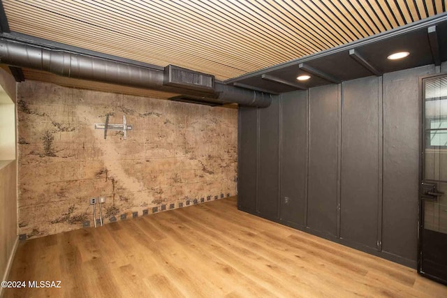 basement with light wood-type flooring