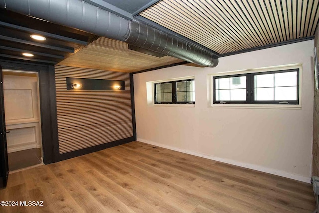 empty room featuring wood-type flooring