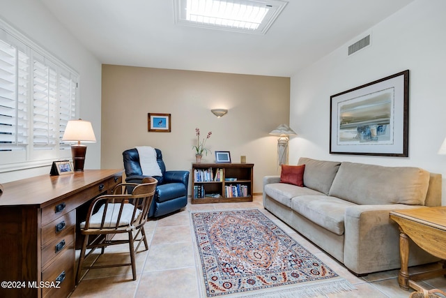 living room featuring light tile patterned flooring