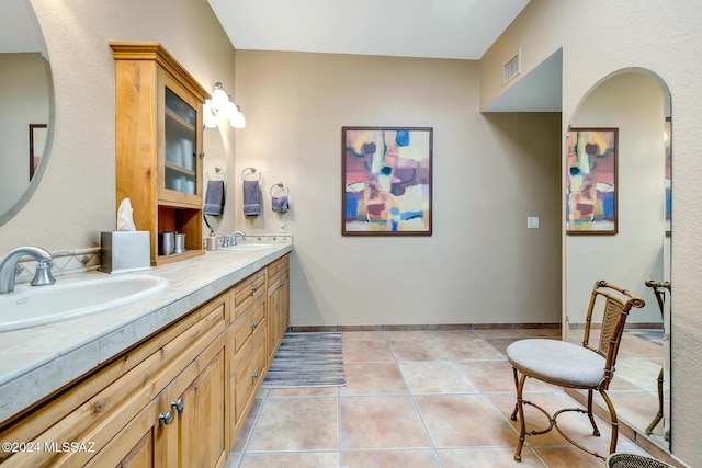 bathroom featuring vanity and tile patterned floors