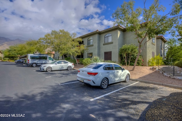 view of parking featuring a mountain view