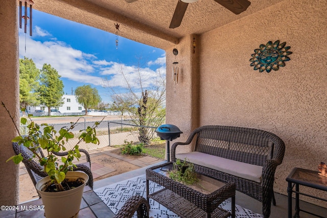 view of patio / terrace featuring ceiling fan