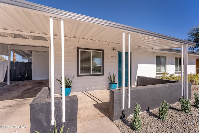 exterior space with a carport