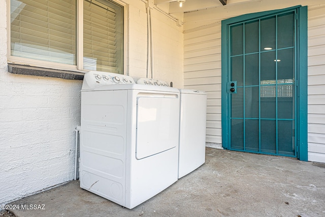 washroom with independent washer and dryer