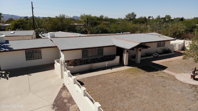 single story home featuring a patio