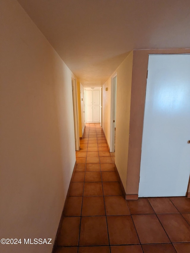 hall featuring tile patterned floors