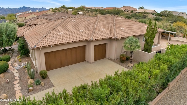 view of front of property with a mountain view