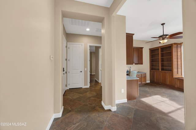 kitchen featuring ceiling fan