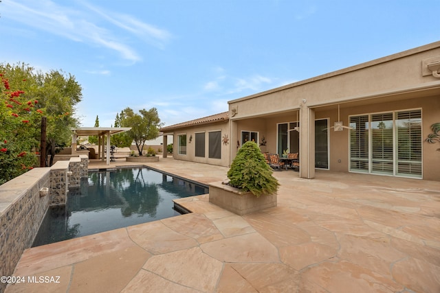 view of swimming pool featuring a patio area