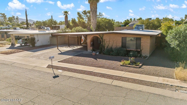 view of front of property featuring a patio area